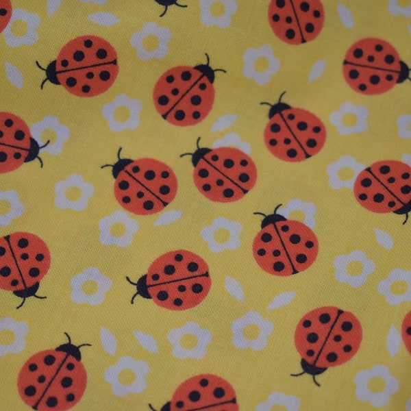 Ladybugs on Yellow Fabric