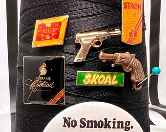 ATF - Alcohol, Tobacco, +  Firearm themed pins from the 1970s-80s, new old stock + retro rescues, get your bare minimum 15 pieces of flair!