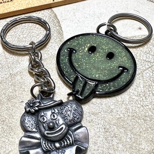 Fun House! Smiley + Clown Metal/Enamel, Pewter Key Chains, NOS vintage 1980-90s, Key Flair! Corral your keys with Retro Magic! Glow in dark!