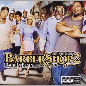 May include: Album cover for the soundtrack of "Barbershop 2: Back in Business." The cover features a group of diverse people in front of a barbershop. The title is in large, stylized text with scissors. Parental advisory warning is visible.