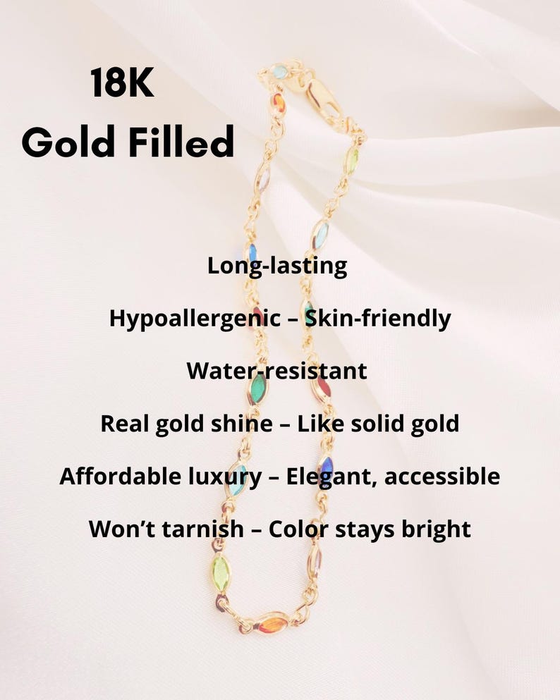 May include: A gold-filled bracelet with colourful, oval-shaped gemstones. The bracelet is labelled "18K Gold Filled" and features text highlighting its long-lasting, hypoallergenic, and water-resistant qualities. The text also mentions its real gold shine and affordable luxury.