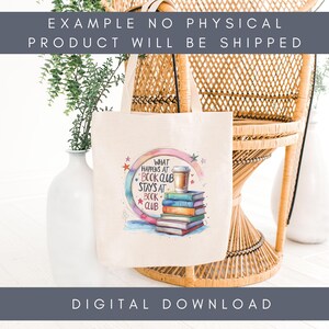 May include: A cream-colored tote bag with a colorful graphic that reads "What Happens at Book Club Stays at Book Club." The design includes a stack of books, a coffee cup, and stars. The bag is hanging on a wicker chair.