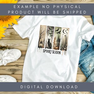 May include: White t-shirt featuring a watercolor design with a spooky theme. The design includes a black cat, bats, a haunted house, and a ghost, with the words "Spooky Season" below. The shirt is a digital download.