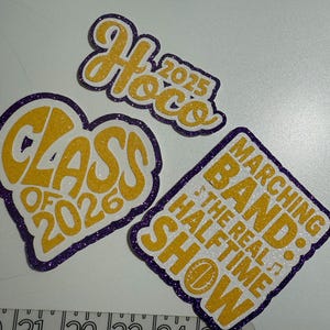 Custom cutouts for Homecoming cheer, football, baseball, clubs