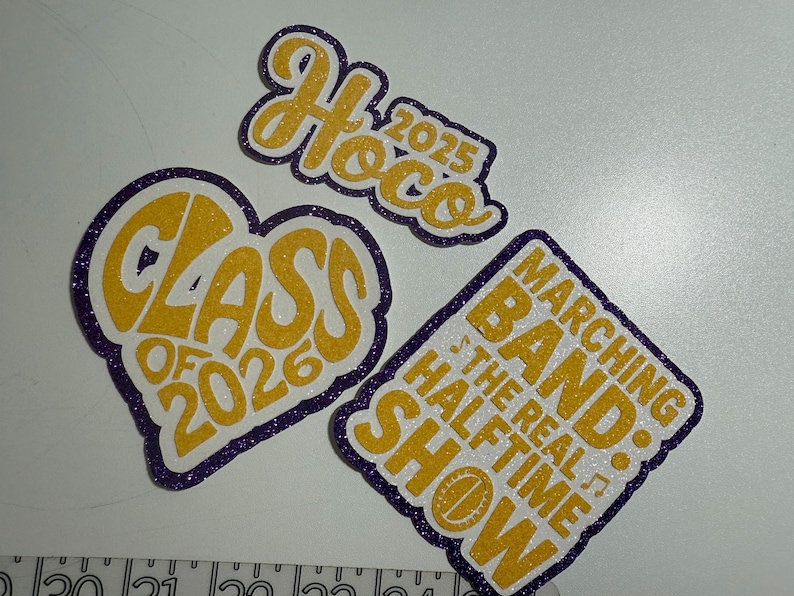 Custom cutouts for Homecoming cheer, football, baseball, clubs
