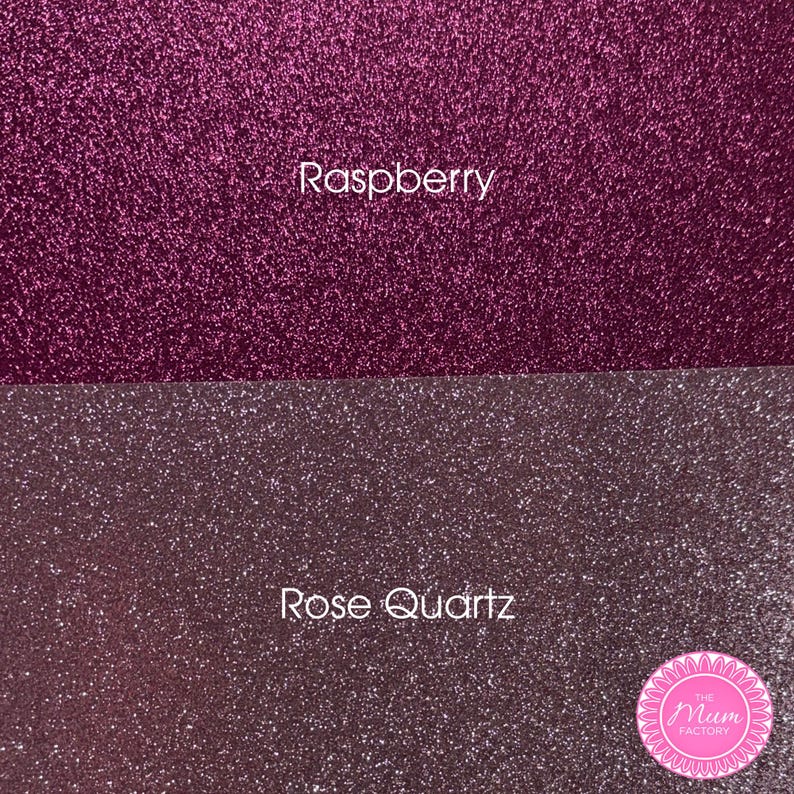 May include: Two horizontal sections of glittery material. The top section is a deep raspberry pink color with the text "Raspberry" centered. The bottom section is a muted rose quartz pink color with the text "Rose Quartz" and a circular logo.