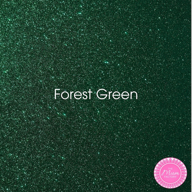 May include: A forest green glitter texture with a dense, sparkling finish. The text "Forest Green" is centered in white, and a circular pink logo with the text "THE MUM FACTORY" is positioned in the bottom right corner of the image.