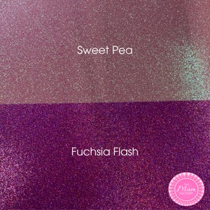 May include: Two horizontal sections of glitter material. The top section is a light mauve color labeled Sweet Pea. The bottom section is a deep magenta color labeled Fuchsia Flash. A circular logo for The Mum Factory is in the bottom right corner.