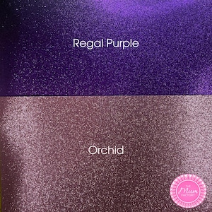 May include: Two rectangular sheets of glitter material. The top sheet is a deep, vibrant purple labeled Regal Purple. The bottom sheet is a lighter, muted mauve-pink labeled Orchid. A circular logo for The Mum Factory is in the bottom right.