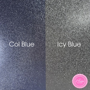 May include: A split-screen display showing two textured glitter surfaces. The left side is a deep navy blue labeled Col Blue, and the right side is a bright, shimmering silver-toned surface labeled Icy Blue. A pink circular logo reads The Mum Factory.