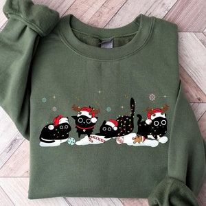 クリスマス黒猫スウェットシャツ、かわいい猫クリスマススウェットシャツ、猫好きへのクリスマスギフト、レディースクリスマススウェットシャツ、猫ママシャツ
