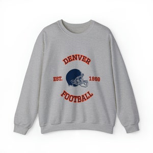 Sudadera unisex con cuello redondo de fútbol de Denver