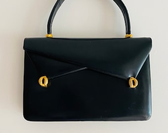 Vintage 50’s navy blue leather handbag with goldtone accents and hardware top handle Purse