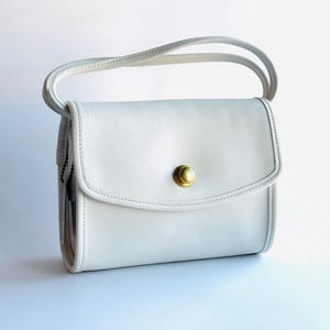 Vintage Coach New York white bone Chrystie Bag 9892 Mint with Brass Hardware, United States 1990s, Springlock Closure, Mini Bag crossbody