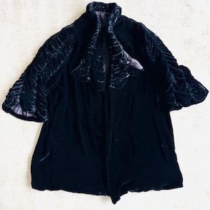 Vintage Antique Poiret style evening opera cloak or jacket in fine black ruched velvet and satin lining button closure