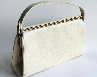 Triangle New York Ostrich Embossed Leather Top Handle Handbag: Cream East West Bag