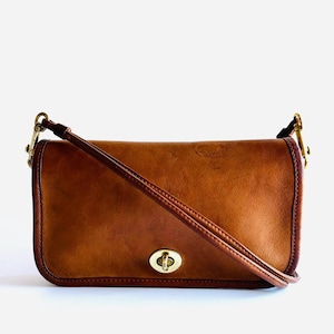 Vintage rare Coach mini clutch early Dinky shoulder bag purse 1970s wonderful patinaed British Tan or Tabac leather by Bonnie Cashin #9375
