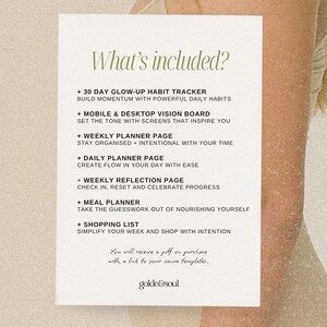 May include: A white paper with the text "What's included?" in green, listing a 30-day habit tracker, vision board, weekly and daily planner pages, a reflection page, meal planner, and shopping list. The paper is against a neutral background.