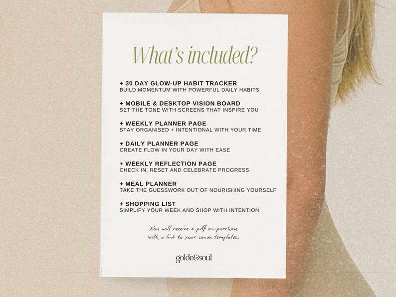 May include: A white paper with the text "What's included?" in green, listing a 30-day habit tracker, vision board, weekly and daily planner pages, a reflection page, meal planner, and shopping list. The paper is against a neutral background.