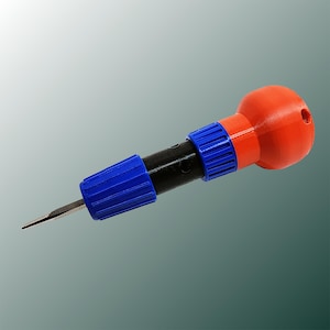 May include: A watch hand remover tool with a sharp, pointed tip. The tool features a black shaft, blue textured grips, and an orange, rounded handle. The tool is designed for watch repair and maintenance.
