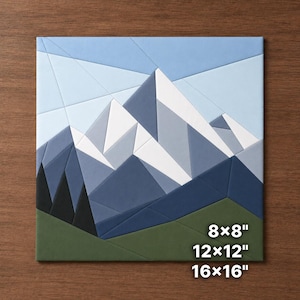 May include: A square wall art piece featuring a geometric mountain landscape in shades of blue, white, and green. The design includes sharp angular shapes representing peaks and trees. Text on the bottom right reads 8x8, 12x12, and 16x16 inches.