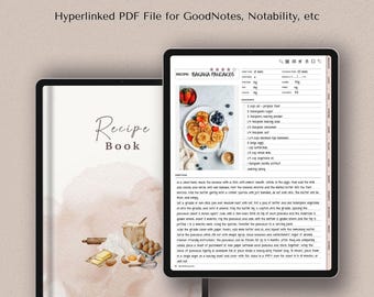May include: A digital recipe book with a watercolor illustration of kitchen tools and ingredients on the left page. The right page shows a recipe for banana pancakes with a photo of the finished dish and a list of ingredients and instructions.