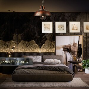 May include: A dark brown leather bed with a brown blanket and white pillows in a bedroom with a dark brown wall and a large painting above the bed. A rustic metal cage pendant light hangs from the ceiling. The text "LAMPIZE STUDIO" is visible in the lower left corner of the image.