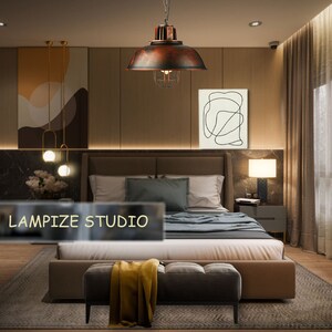 May include: A bedroom with a large bed, a brown leather headboard, and a brown leather footboard. The bed has a white duvet and a gray throw blanket. There is a brown leather ottoman in front of the bed with a yellow throw blanket on it. There is a large, rusty-colored pendant light hanging over the bed. The pendant light has a cage-like design. There is a white framed picture on the wall behind the bed. The picture has a black line drawing of a shape. There is a brown lamp on a nightstand next to the bed. The lamp has a white shade. There is a brown rug on the floor. The text "LAMPIZE STUDIO" is visible in the lower left corner of the image.