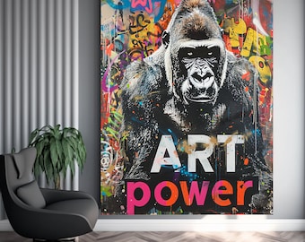 May include: A black and white gorilla with a colorful graffiti background. The words "ART power" are written in white and pink letters on the bottom of the image.