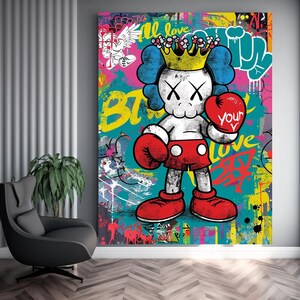 May include: A colorful graphic art print featuring a cartoon character wearing a boxing glove and a crown. The character is standing in a boxing ring with the words "Beat Your Love" and "All Love" in the background.
