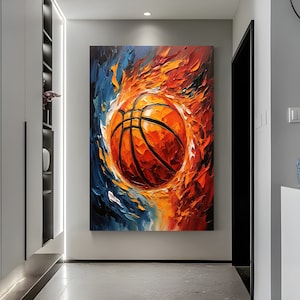May include: Abstract painting of a basketball in a fiery orange and blue swirl. The basketball is orange with black lines and is in the centre of the painting.