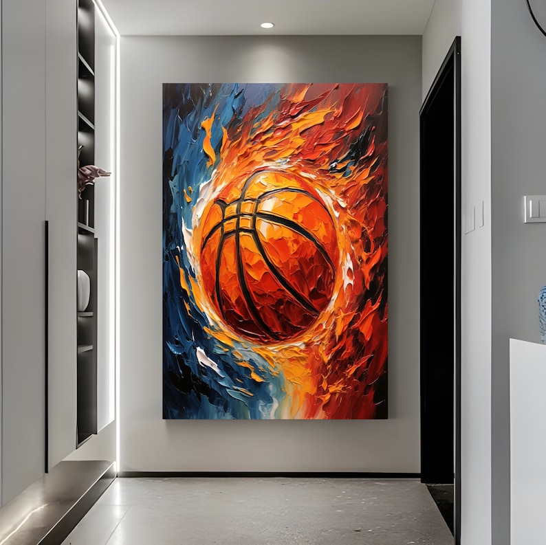 May include: Abstract painting of a basketball in a fiery orange and blue swirl. The basketball is orange with black lines and is in the centre of the painting.