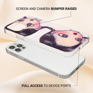May include: A clear phone case with a raised edge around the camera and screen. The case features a colorful illustration of two girls with pigtails. The text "SCREEN AND CAMERA BUMPER RAISED" is at the top of the image. The text "FULL ACCESS TO DEVICE PORTS" is at the bottom of the image.