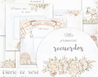 Op de afbeelding: Een printbaar baby-herinneringsboek met een aquarelbloemendesign. De omslag heeft een cirkel met de tekst "Mis primeros recuerdos" en een bloemenkrans met een babyratel, blokken die "BABY" spellen en slofjes. Het boek bevat pagina's om mijlpalen te registreren zoals de eerste stapjes, de eerste dag thuis en het gewicht.