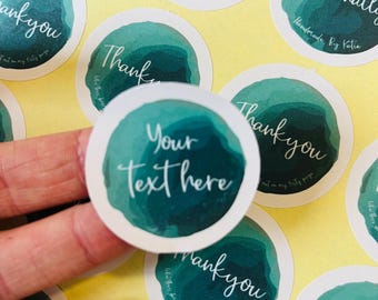 May include: Round stickers with a watercolor design in shades of green and white. The stickers have the text "Personally Handmade By Katie" and "Thank you" on them. One sticker has the text "Your Text Here".