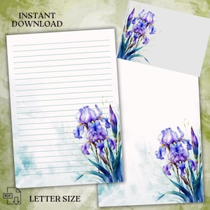 Peut inclure: Papier à lettres imprimable avec une illustration aquarelle d'iris violets avec des feuilles vertes sur fond blanc. Le papier est ligné et présente un lavis aquarelle bleu clair en bas. Le texte "LETTER SIZE" est imprimé en bas de la page.