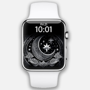 May include: A white Apple Watch with a black face displaying the time "10:01" and the date "Fri 21". The watch face features a black and white illustration of a crescent moon and stars.