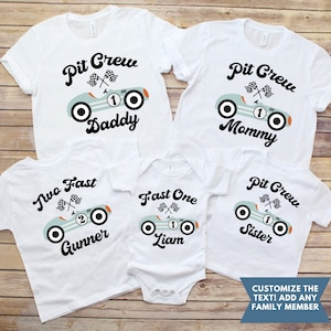 May include: White t-shirts with a blue vintage race car design and text that says "Pit Crew Daddy", "Pit Crew Mommy", "Two Fast Gunner", "Fast One Liam", and "Pit Crew Sister".