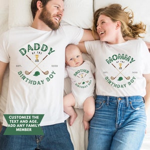 May include: White t-shirts with green and gold golf-themed graphics that say "Daddy of the Birthday Boy", "Mommy of the Birthday Boy", and "Brother of the Birthday Boy".