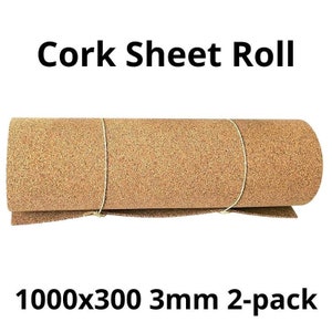 May include: A rolled cork sheet, secured with string, against a white background. The text "Cork Sheet Roll" is at the top, and "1000x300 3mm 2-pack" is at the bottom. The cork has a natural, light brown colour.