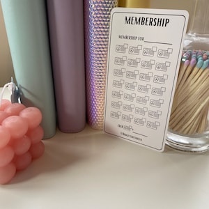 May include: A white printable membership tracker with black text and icons. The text reads "MEMBERSHIP" and "MEMBERSHIP FOR". There are 20 icons of a person with a checkmark. The text at the bottom reads "EACH =" and "@BUDGETWITHBETH".