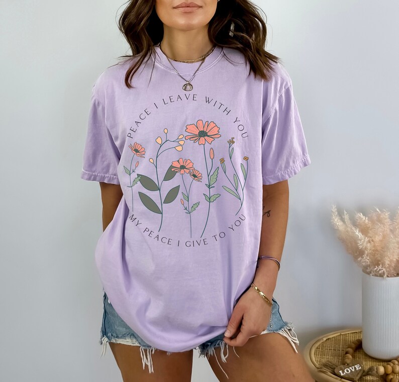 Comfort Colors Peace I Leave With You Tshirt John 14:27 Peace T-shirt Wild Flowers Tee Daisies Minimalistic Bible Verse shirt Scripture Tee in Orchid (light purple).