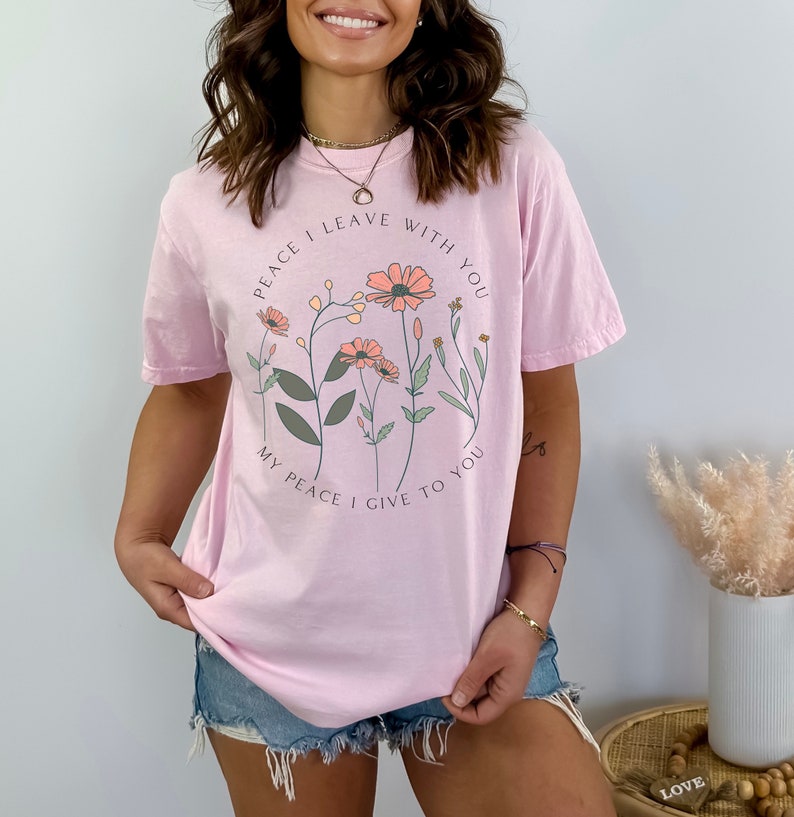 Comfort Colors Peace I Leave With You Tshirt John 14:27 Peace T-shirt Wild Flowers Tee Daisies Minimalistic Bible Verse shirt Scripture Tee in Blossom (Light Pink).
