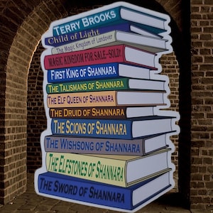 May include: A vertical stack of ten books with colorful spines and white pages. The titles include Terry Brooks, Child of Light, The Magic Kingdom of Landover, Magic Kingdom for Sale-Sold!, First King of Shannara, The Talismans, Elf Queen, Druid, Scions, Wishsong, Elfstones, and The Sword of Shannara.