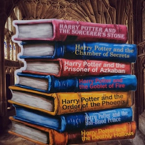 Pegatina para portátil o botella de agua con la pila de libros de Harry Potter de J.K. Rowling