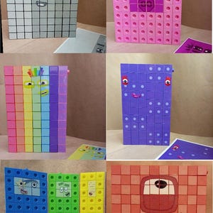 May include: A collection of six rectangular structures built from interlocking plastic cubes, each featuring a unique character face. The figures include a grey block, a pink block, a rainbow-striped block, a purple block, three smaller blue, green, and yellow blocks, and a large orange block.