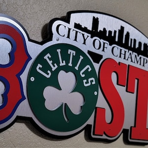 Boston sports teams themed wall décor with &quot;City of Champions&quot;.