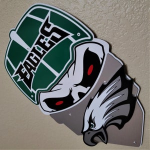 Philadelphia Eagles themed facemask wall décor.