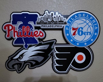 Philadelphia sports teams wall décor with skyline.