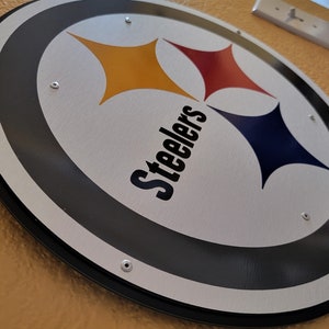 Steelers round wall décor.